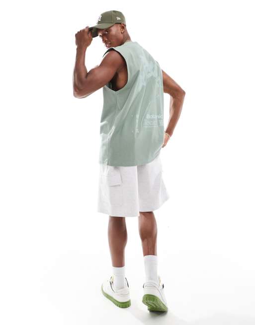 ASOS DESIGN oversized singlet in green texture with floral back print ...