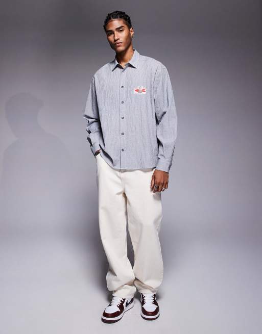 ASOS DESIGN - Oversized skjorte med mærke på brystet og marineblå tern i firkantet pasform, 2 af 4