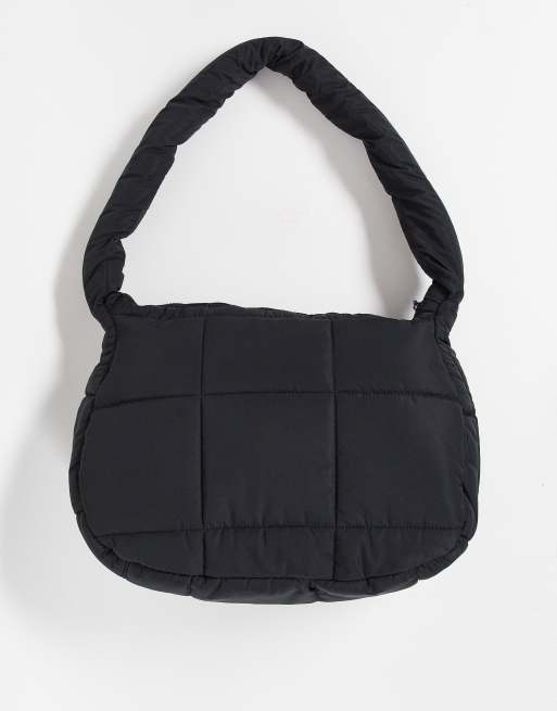 ASOS DESIGN oversized sling bag in black nylon