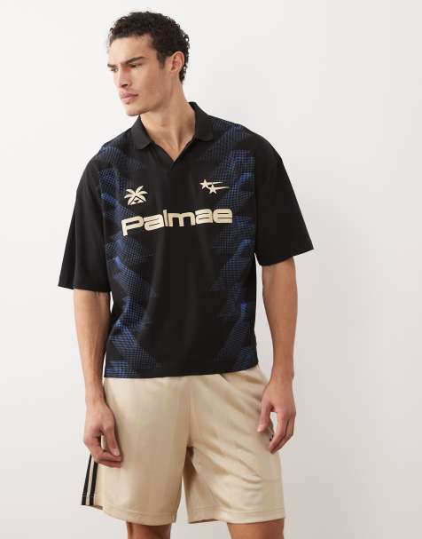 ASOS DESIGN - Oversized sort polo med gennemgående fodboldgrafik i firkantet pasform - view 1