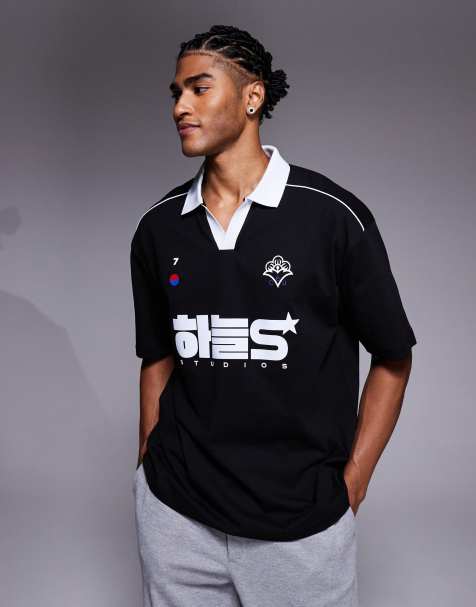 ASOS DESIGN - Oversized sort poloskjorte med kontraststriber og grafisk sportsprint - view 1
