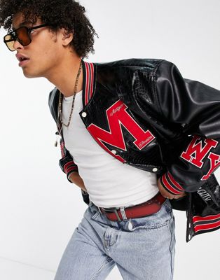ASOS DESIGN oversized spliced varsity jacket in black faux leather with badges - ASOS Price Checker