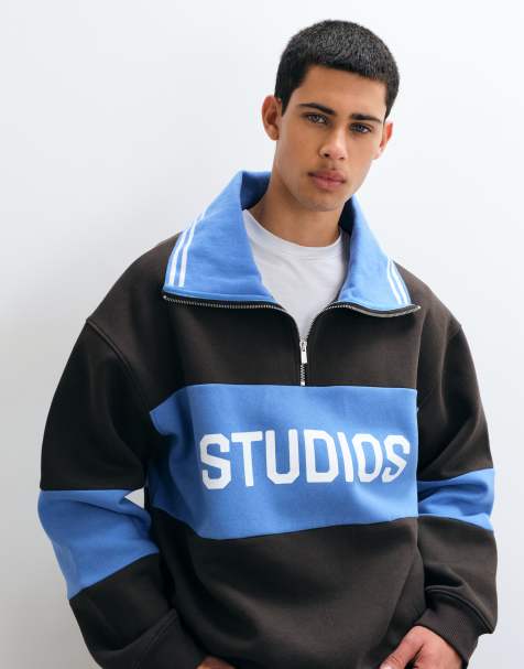 ASOS DESIGN oversized spread collar half zip sweatshirt with contrast rib, cut & sew panel and print in brown and blue - view 1