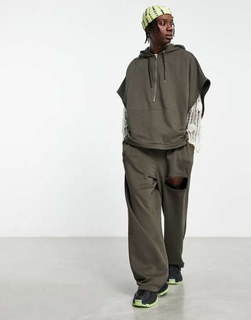 ASOS DESIGN oversized straight leg sweatpants with cut out in khaki