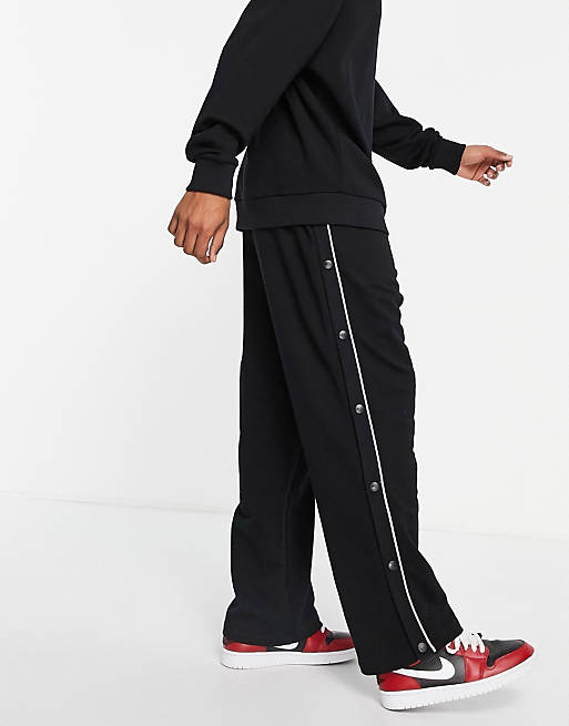 ASOS DESIGN oversized straight leg sweatpants with snaps and piping in  black - part of a set