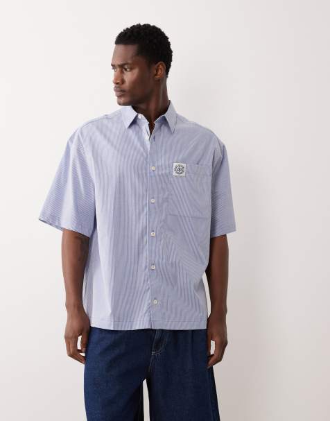ASOS DESIGN oversized stripe shirt with chest badge in blue
