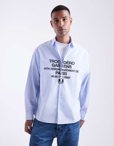 ASOS DESIGN oversized stripe shirt with chest print in blue - view 1