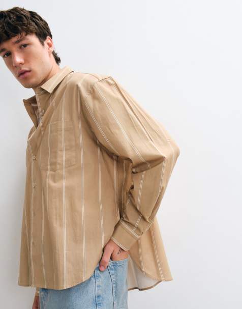 ASOS DESIGN oversized stripe shirt with curved hem in beige - view 1