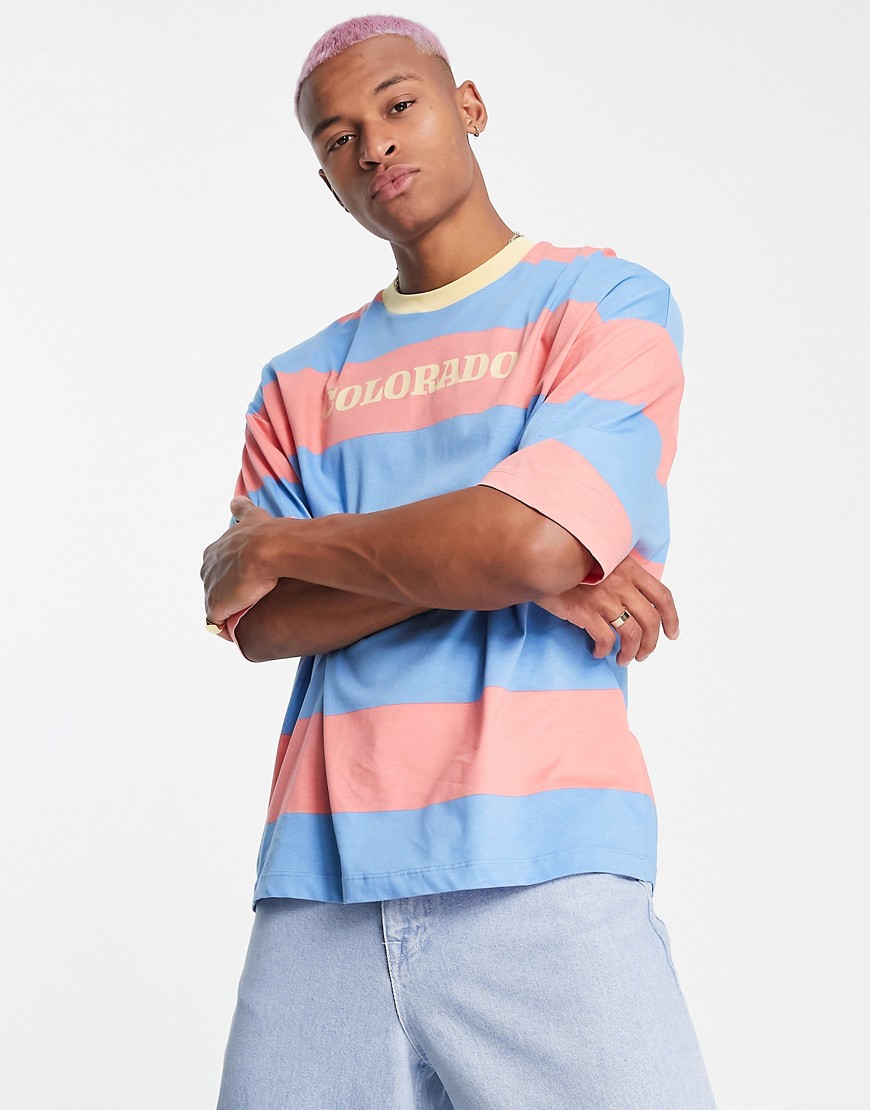 ASOS DESIGN oversized stripe t-shirt with city print in blue & pink