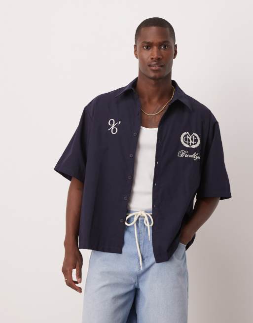 ASOS DESIGN oversized striped shirt with embroidery in navy