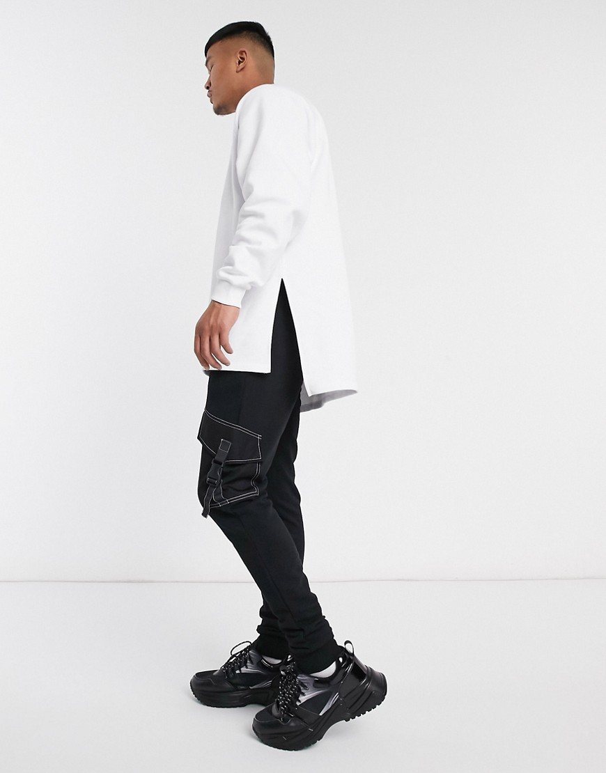 ASOS DESIGN oversized super longline sweatshirt with side splits & dropped hem in white