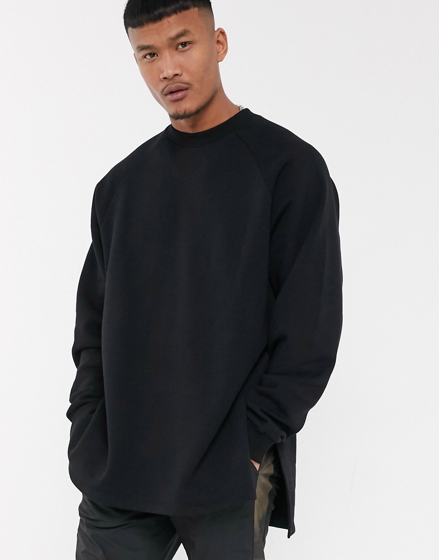 ASOS DESIGN - Oversized superlang sweatshirt met zijsplitten en lage achterkant in zwart