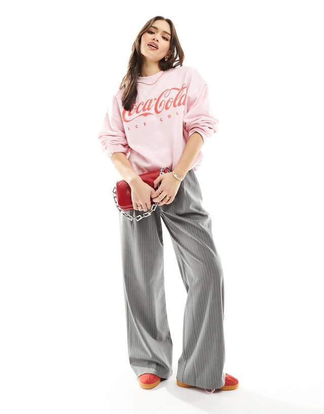 ASOS DESIGN - oversized sweat with coca cola licence graphic in pink