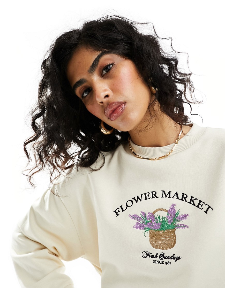 ASOS DESIGN oversized sweat with embroidered flower market graphic in white