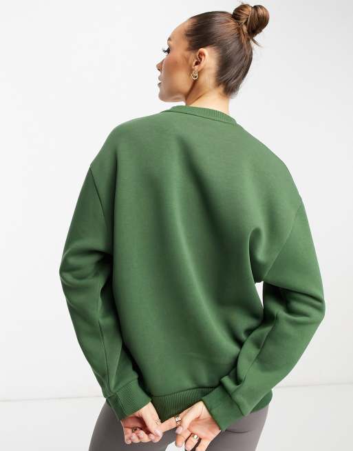 ASOS DESIGN oversized sweatshirt in acid washed green with central  embroidery