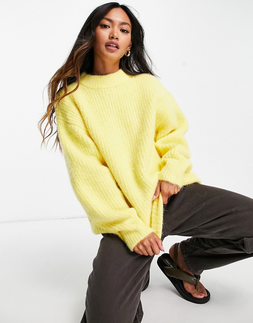 ASOS DESIGN oversized sweater in premium yarn in rib in yellow