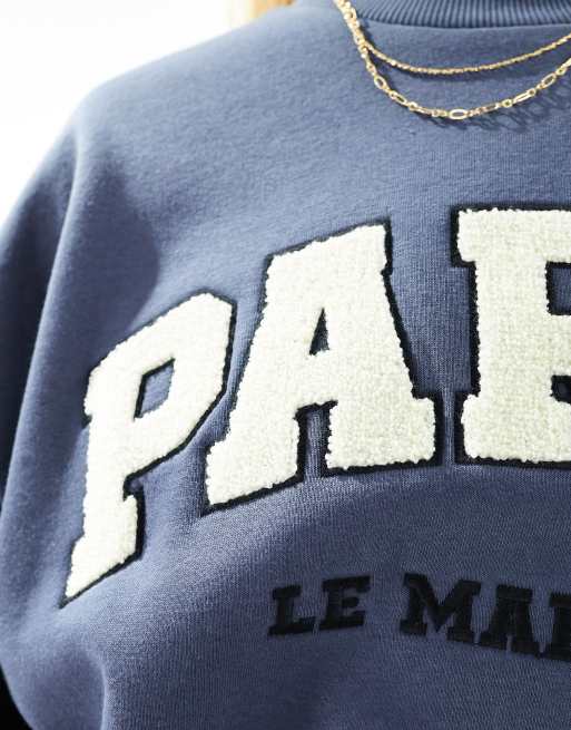 ASOS DESIGN - Oversized sweater met crèmekleurige Paris-print in licht marineblauw, 2 van 4