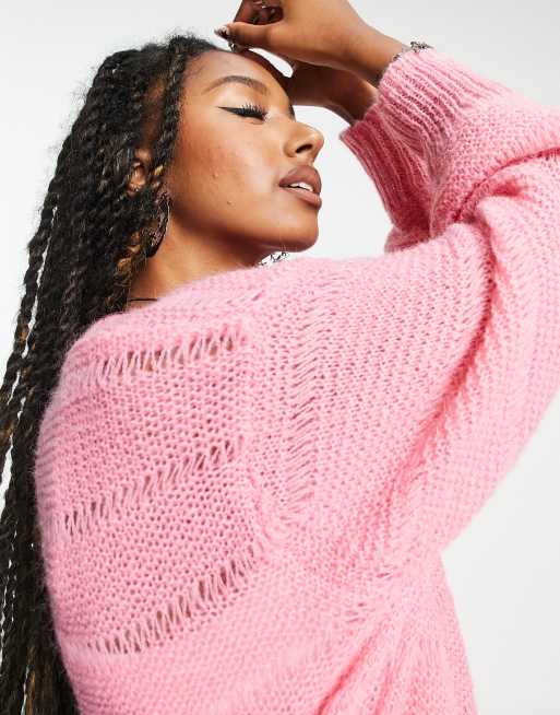 ASOS DESIGN oversized sweater with loose textured stitch in pink