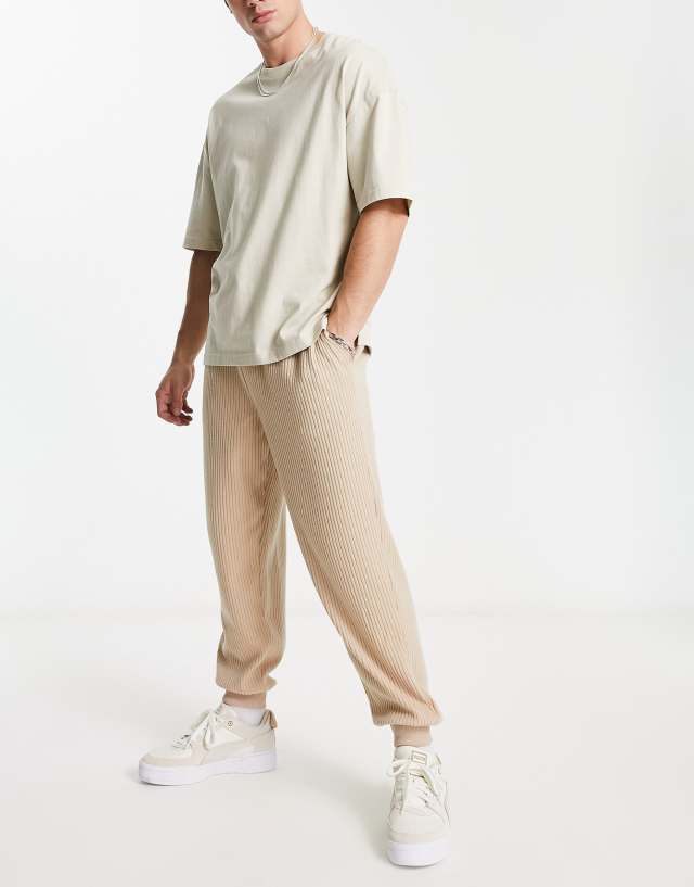 ASOS DESIGN oversized sweatpants in beige brushed rib texture