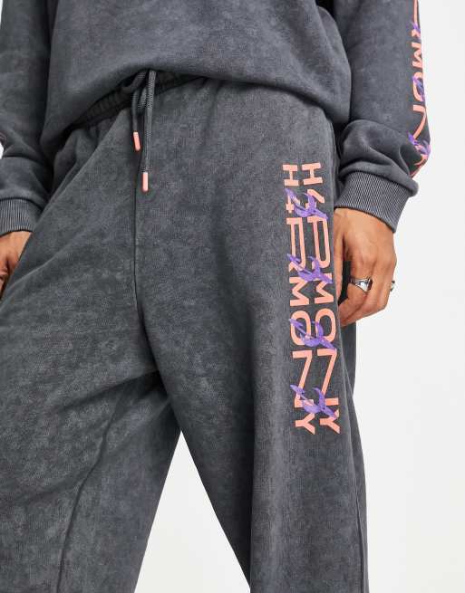 ASOS DESIGN Petite oversized sweatpants in acid wash black