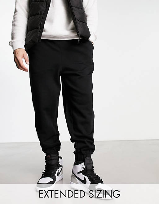 ASOS DESIGN oversized sweatpants in black - BLACK