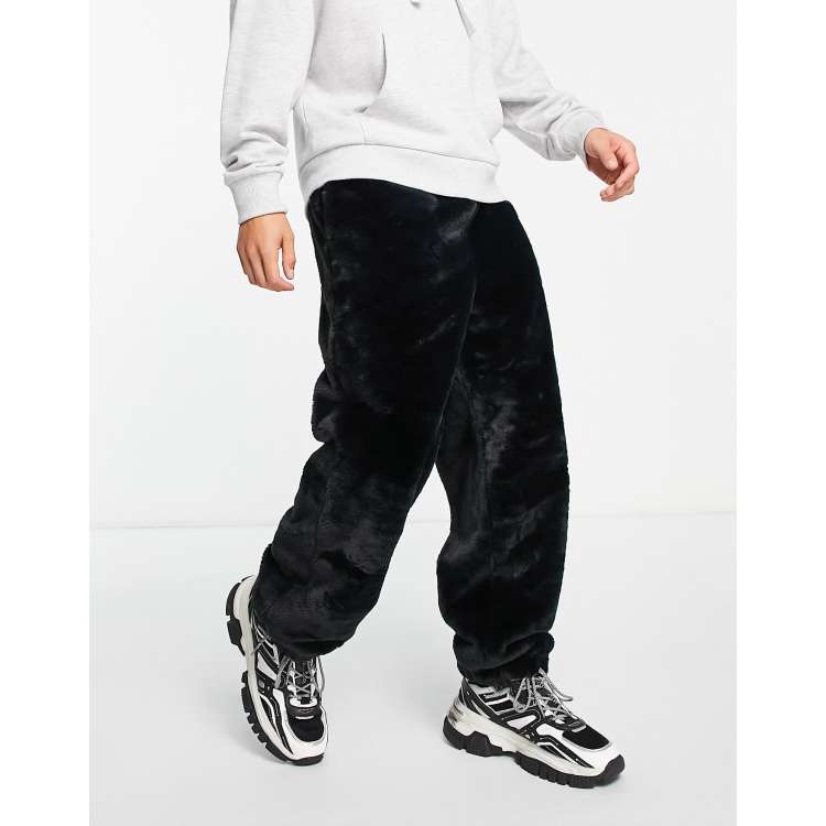 ASOS DESIGN oversized sweatpants in black faux fur ASOS