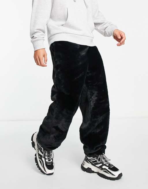 ASOS DESIGN oversized sweatpants in black faux fur