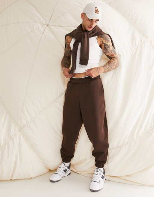 ASOS DESIGN oversized sweatpants with cargo pocket in chocolate brown