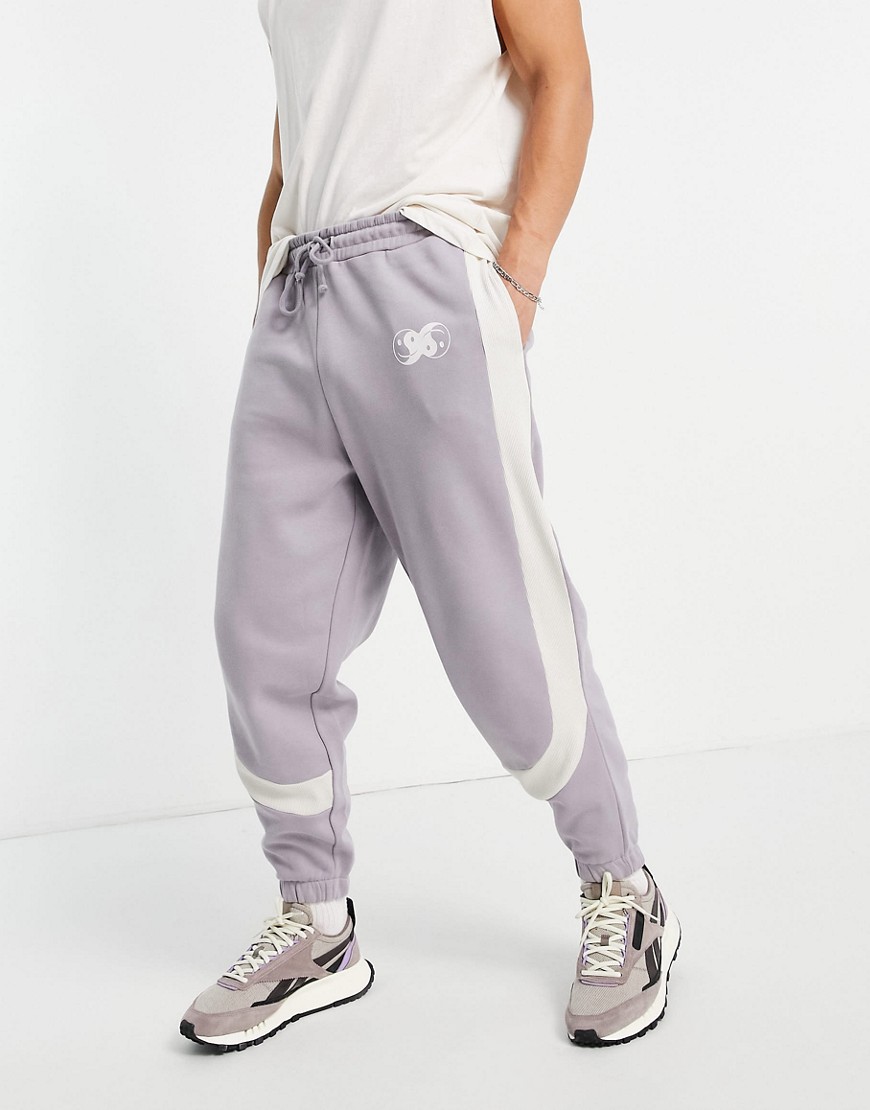 ASOS DESIGN oversized sweatpants in gray color block with rib details-Purple