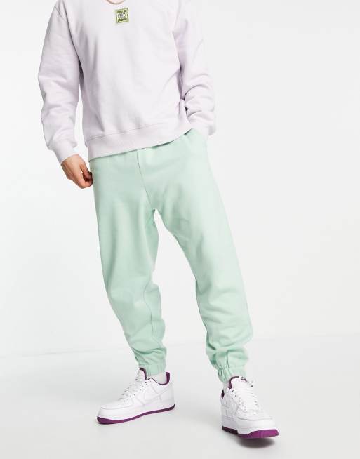 ASOS DESIGN oversized sweatpants in pastel green part of a set