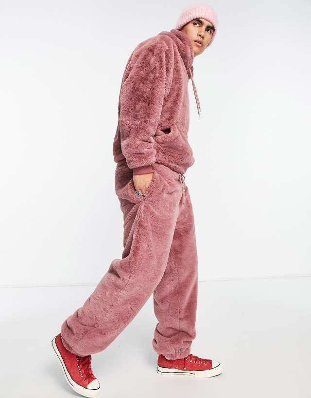 ASOS DESIGN oversized sweatpants in pink faux fur