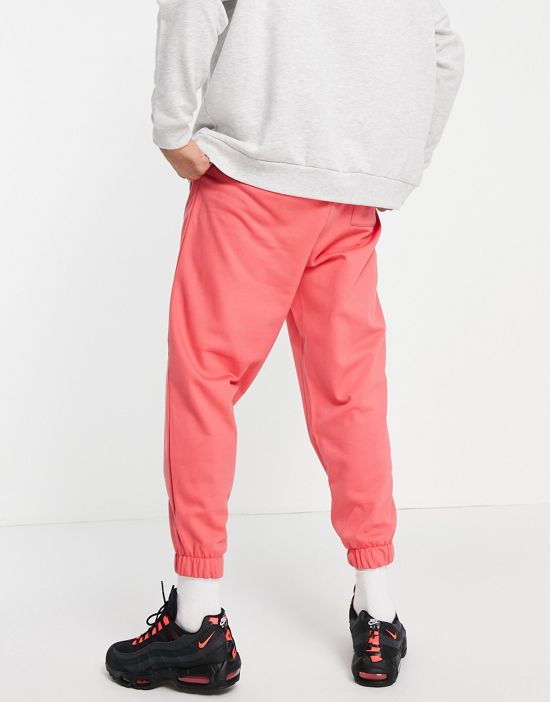 https://images.asos-media.com/products/asos-design-oversized-sweatpants-in-pink-pink-part-of-a-set/23304250-2?$n_550w$&wid=550&fit=constrain