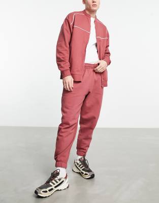 ASOS DESIGN oversized sweatpants in red - part of a set