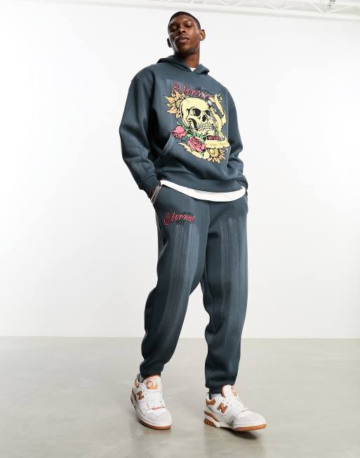 ASOS DESIGN oversized sweatpants in washed charcoal with grunge text print  - part of a set