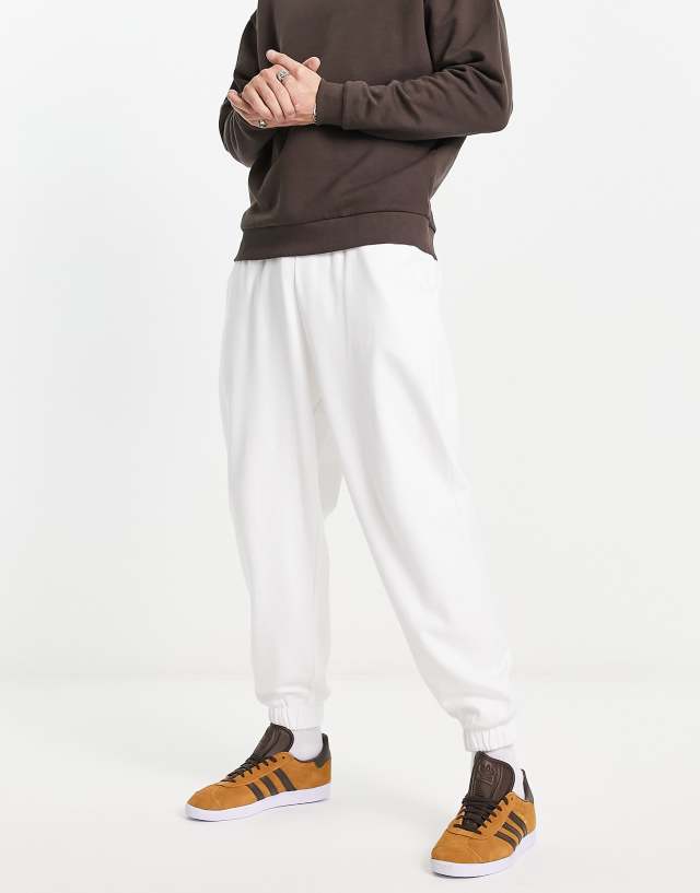 ASOS DESIGN oversized sweatpants in white