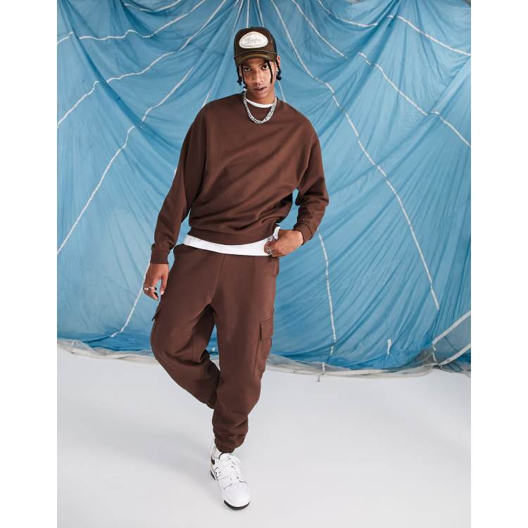 ASOS DESIGN oversized sweatpants with cargo pocket in chocolate brown