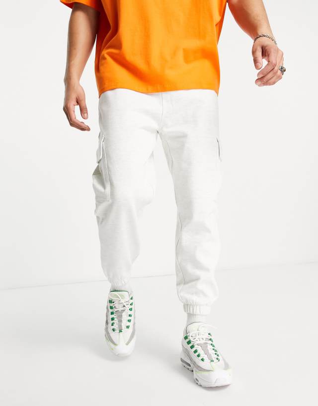 ASOS DESIGN oversized sweatpants with cargo pockets in white marl