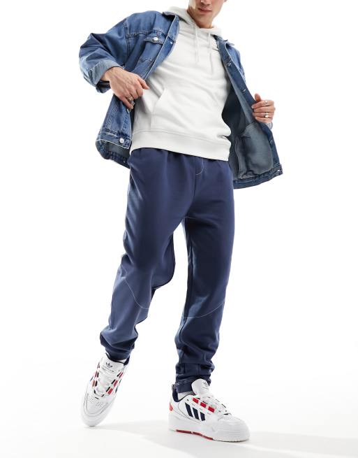 ASOS DESIGN oversized sweatpants with contrast stitching in navy