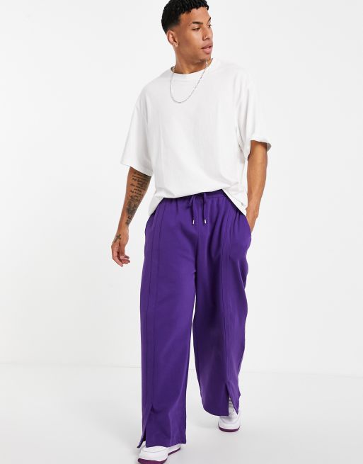 ASOS DESIGN oversized sweatpants with front slit detail in purple