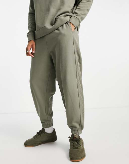 ASOS DESIGN oversized sweatpants with ribbed panels in green - part of a set