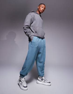 Asos Design Oversized Sweatpants With Seam Detail In Washed Blue