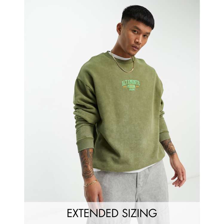 ASOS DESIGN oversized sweatshirt in acid washed green with central