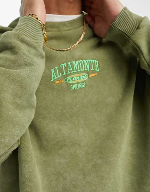 ASOS DESIGN oversized sweatshirt in acid washed green with central  embroidery