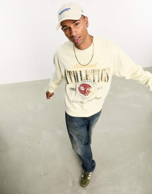 ASOS DESIGN - Oversized sweatshirt in beige met wassing en print in collegestijl