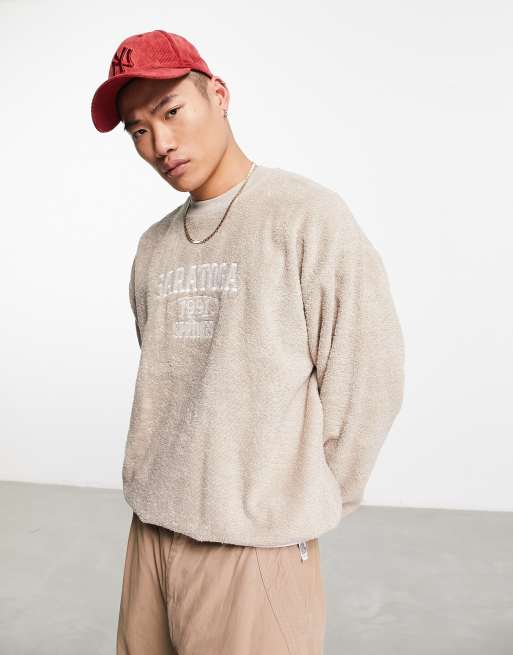 ASOS DESIGN oversized sweatshirt in beige towelling with city embroidery