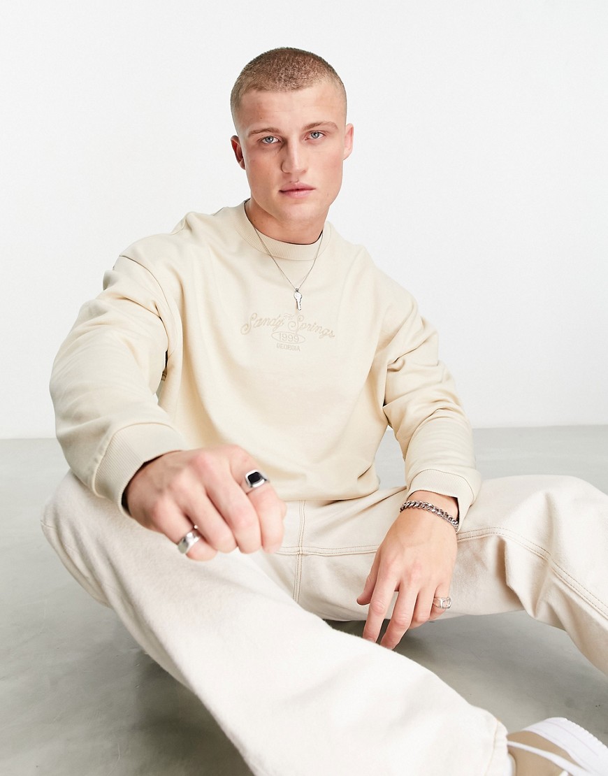 ASOS DESIGN oversized sweatshirt in beige with central embroidery-Neutral