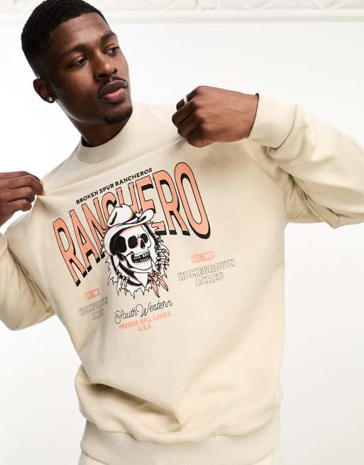 ASOS DESIGN oversized sweatshirt in beige with cowboy skull print