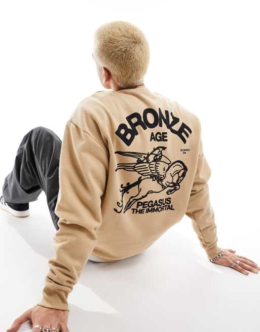 ASOS DESIGN oversized sweatshirt in beige with mythic back print