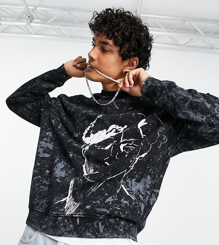 ASOS DESIGN oversized sweatshirt in black acid wash with off-centre face line drawing print