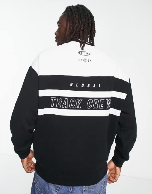 ASOS Design Oversized Hockey Jersey with City Print in Black and Orange